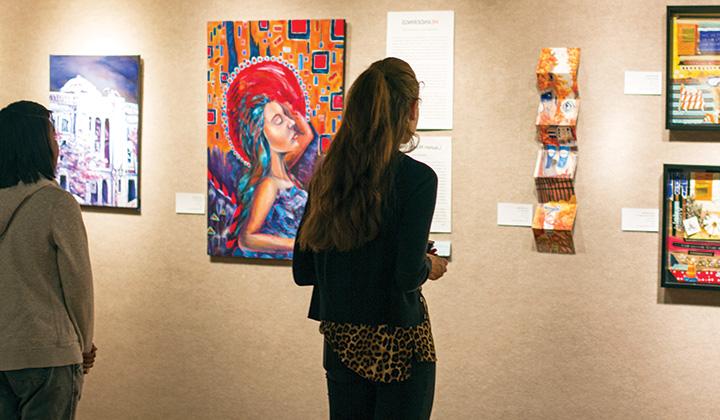 Students viewing art exhibition